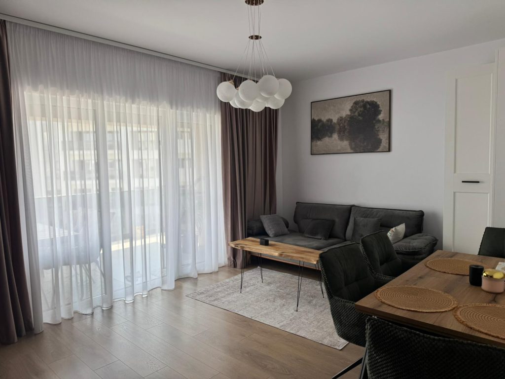 Apartament cu 2 camere decomandat, terasa generoasa si acces rapid la facilitati – Drumul Binelui